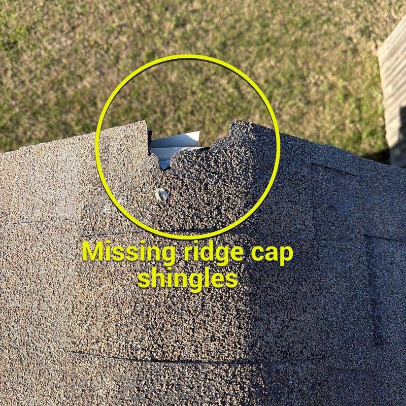Ridge cap shingles with missing section on roof edge