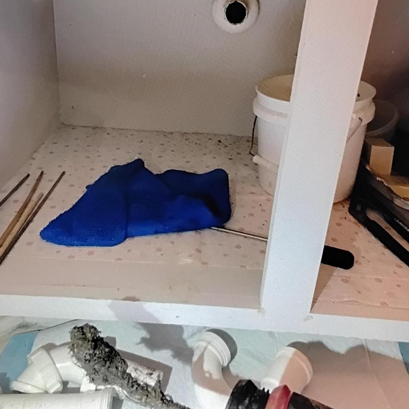 Bathroom lavatory drain pipe with blockage removal tools