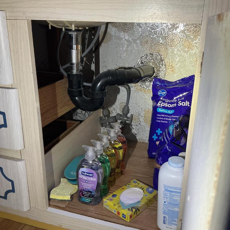 Bathroom sink drain pipe and water shutoff valves Bathroom sink drain pipe and water shutoff valves
