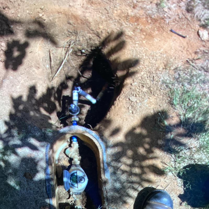 Pressure reducing valve with access box in soil excavation