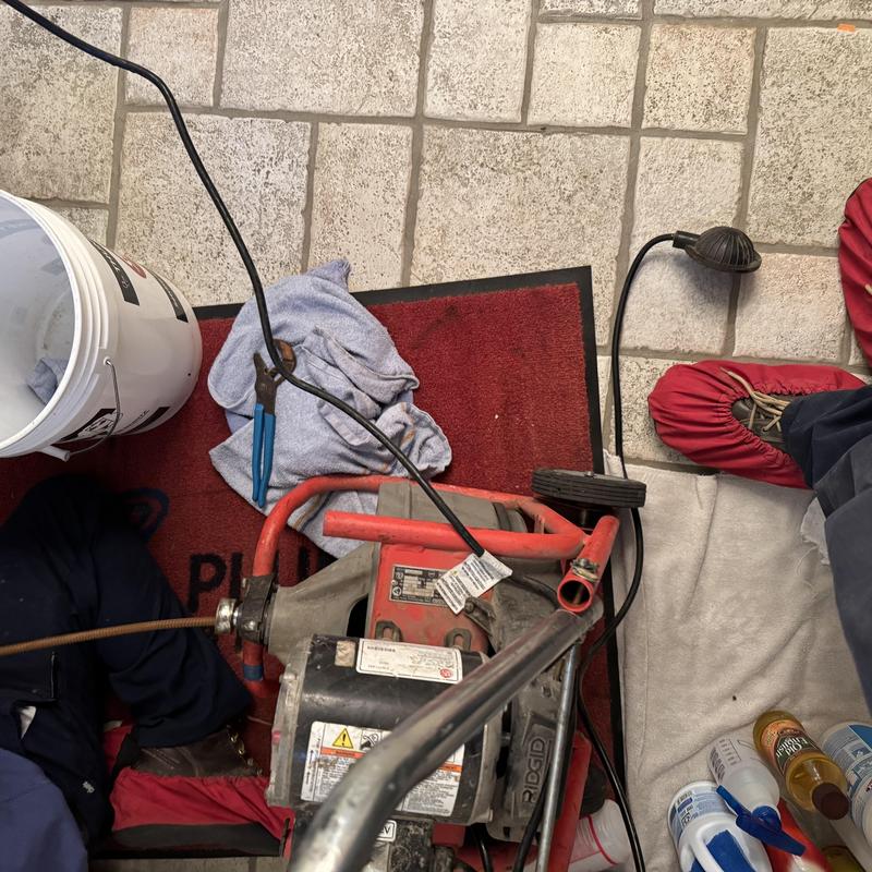 Laundry sink drain snake clearing blockage with tools Laundry sink drain snake clearing blockage with tools