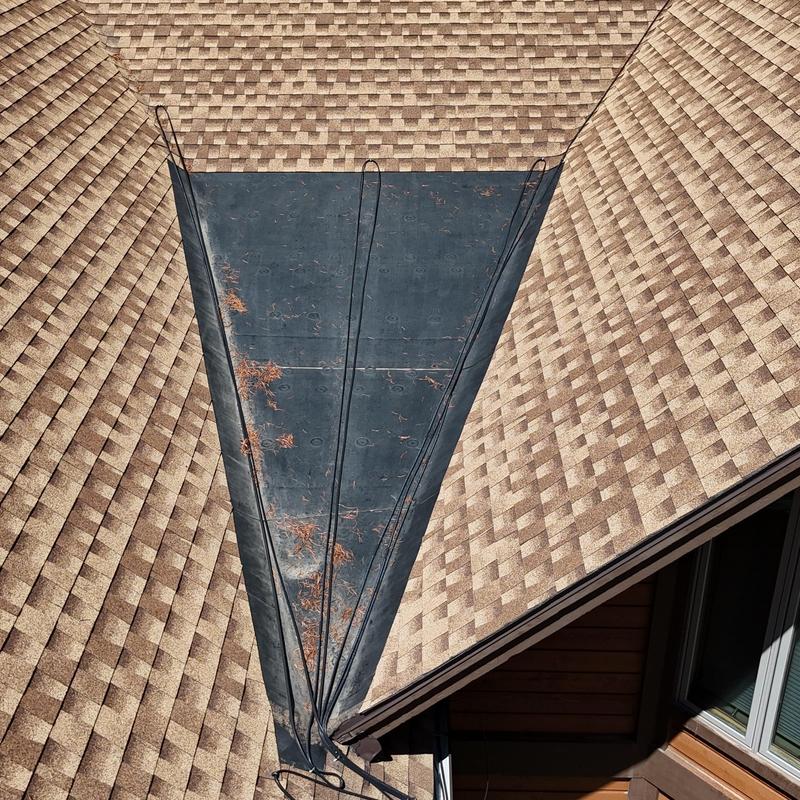 Roof valley flashing with heat tape installed Roof valley flashing with heat tape installed