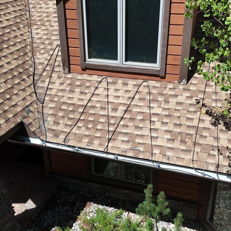 5in k-style gutters with heat tape on brown roof 5in k-style gutters with heat tape on brown roof