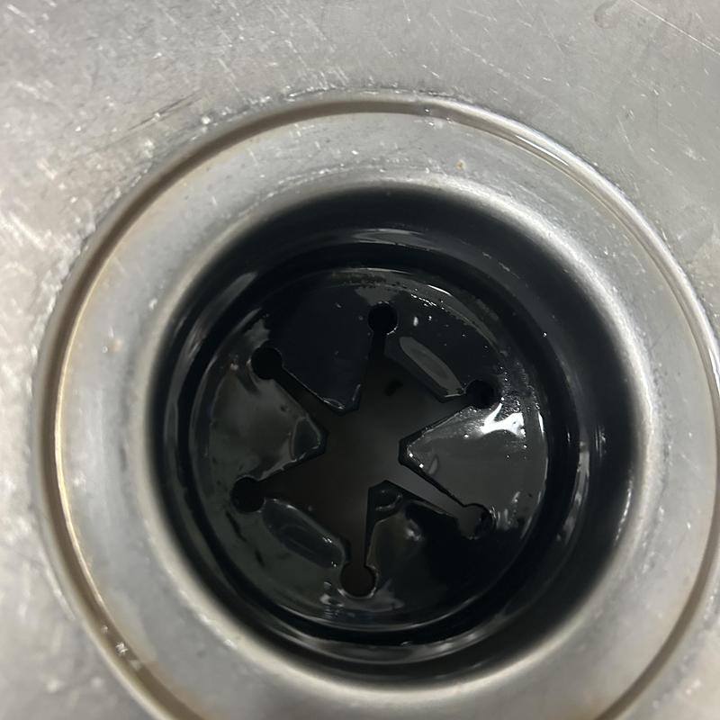 Kitchen sink drain stopper with black rubber seal Kitchen sink drain stopper with black rubber seal