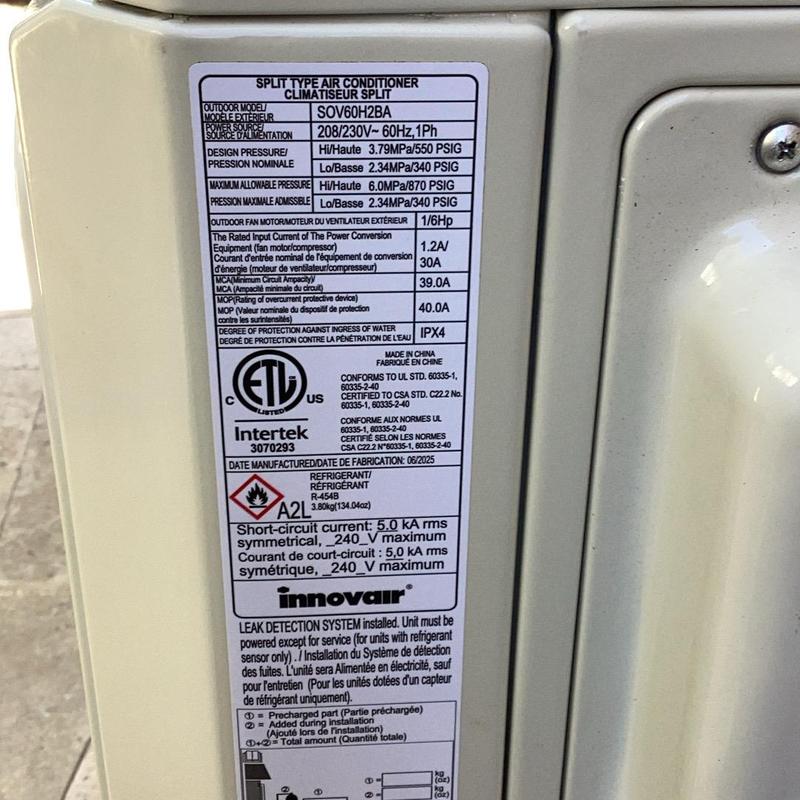 Split type air conditioner model label close-up