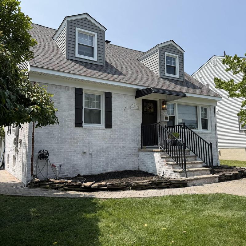 Owens Corning Duration Colonial Slate roofing on house Owens Corning Duration Colonial Slate roofing on house