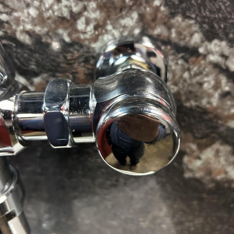 Water hammer arrestor valve on commercial plumbing system Water hammer arrestor valve on commercial plumbing system
