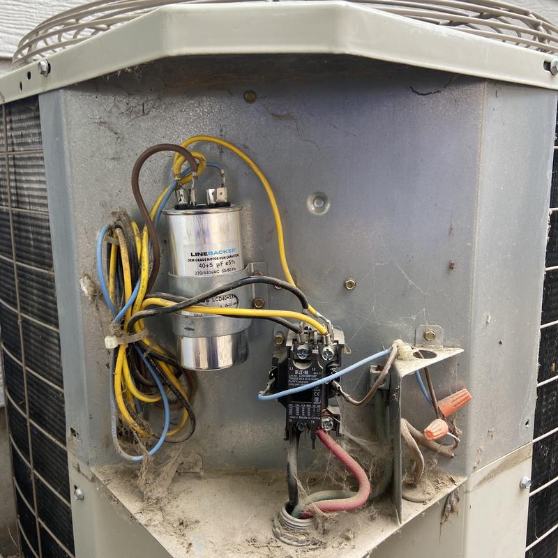 AC capacitor and wiring inside outdoor unit housing AC capacitor and wiring inside outdoor unit housing
