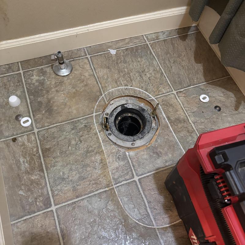 Toilet flange and seal replacement on tiled floor Toilet flange and seal replacement on tiled floor