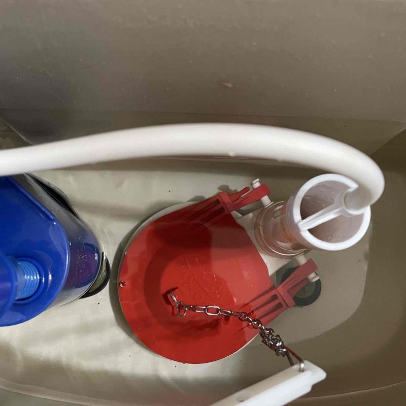 Toilet flapper and fill valve inside toilet tank