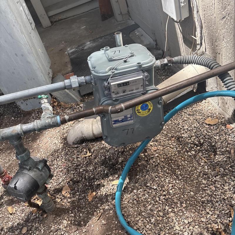 Gas meter installation with piping and pressure test