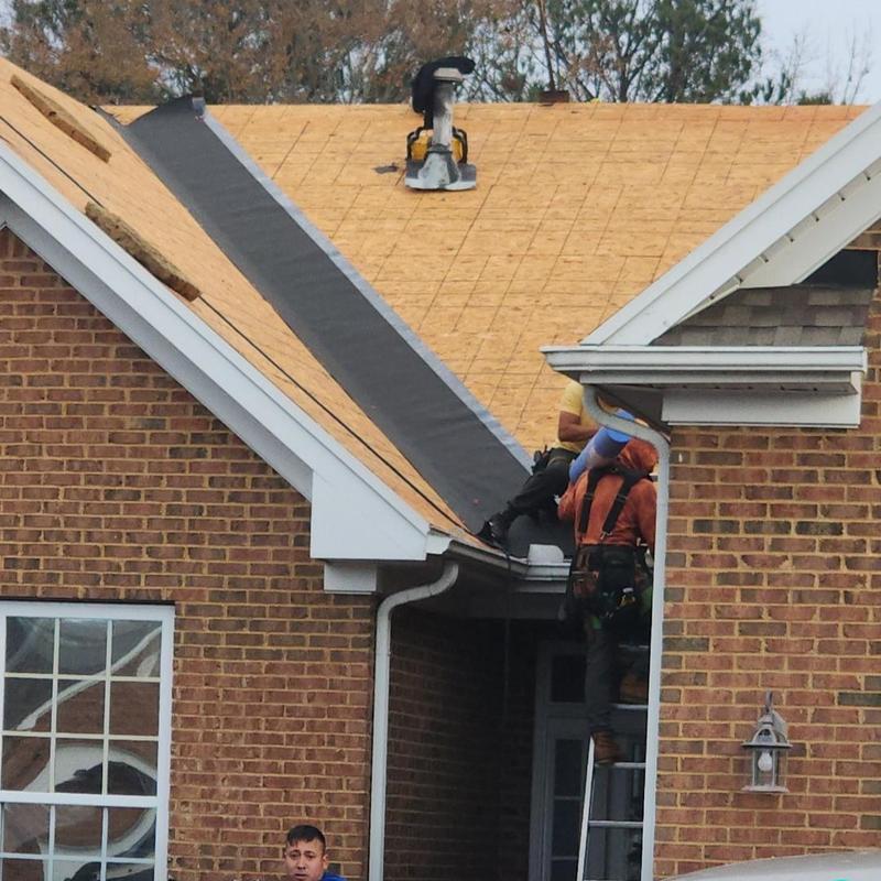 Architectural shingle roof installation with underlayment Architectural shingle roof installation with underlayment