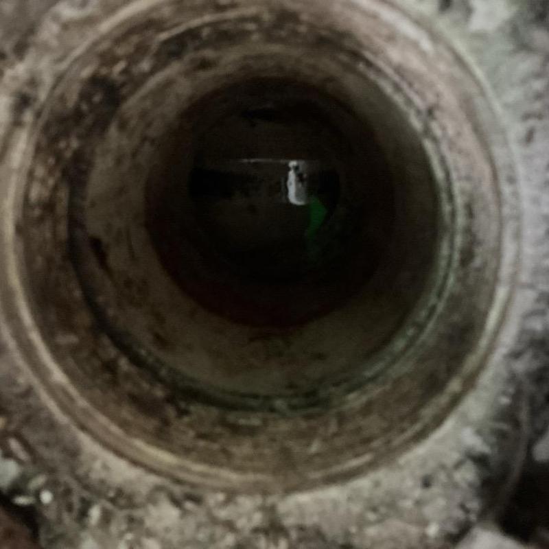 Cast iron drain pipe with major holes and cracks Cast iron drain pipe with major holes and cracks
