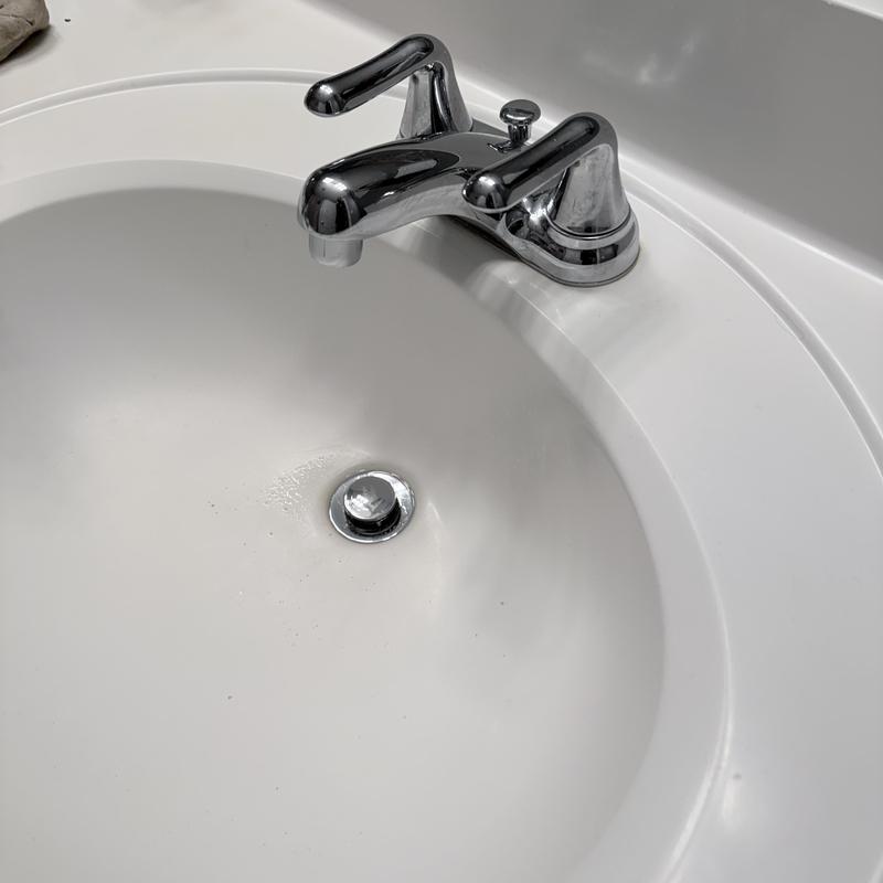 Double vanity faucets and drain assembly installation Double vanity faucets and drain assembly installation