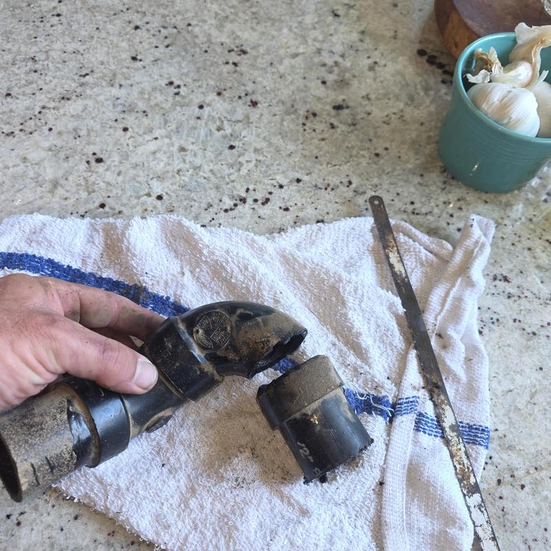 Broken ABS drain pipe fitting above kitchen sink repair