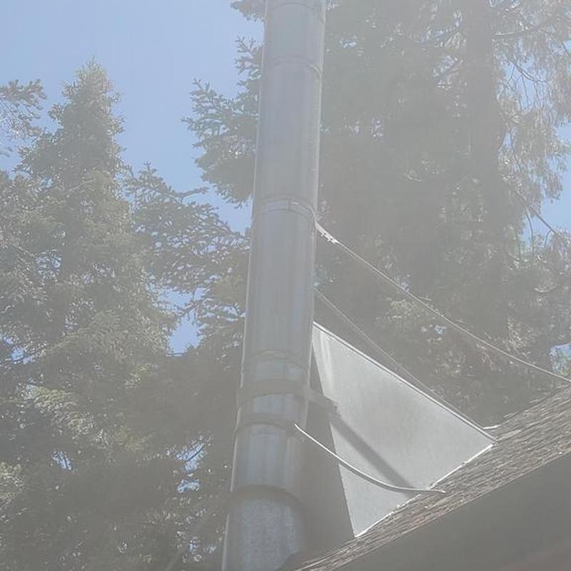 Chimney brace and snow splitter on roof in Arnold CA