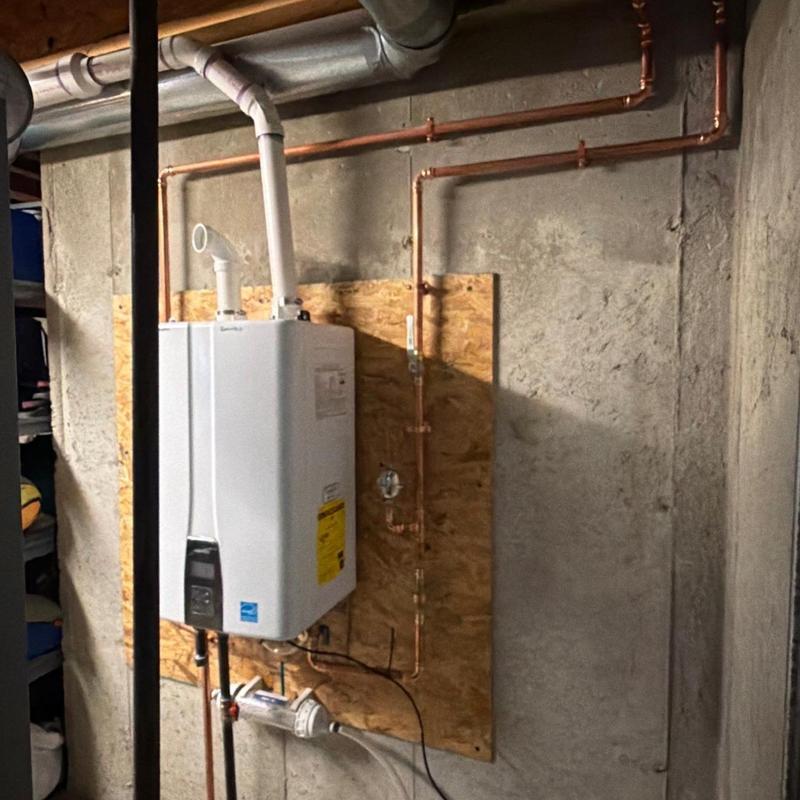 Tankless water heater with PVC exhaust and copper piping Tankless water heater with PVC exhaust and copper piping