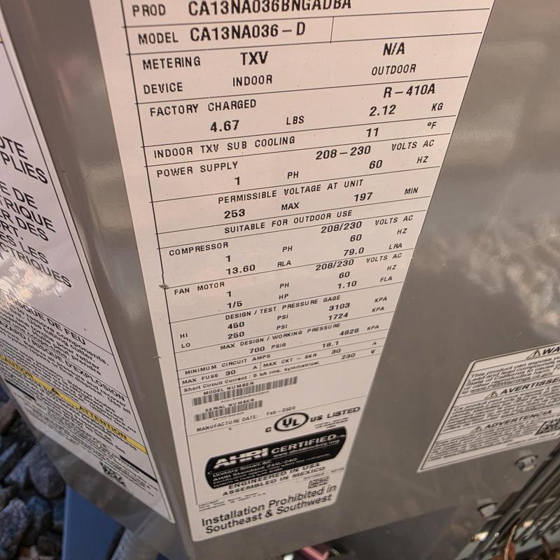 Carrier CA13NA036-D air conditioner label close-up Carrier CA13NA036-D air conditioner label close-up