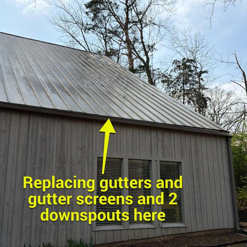 Gutters and downspouts replacement on metal roof