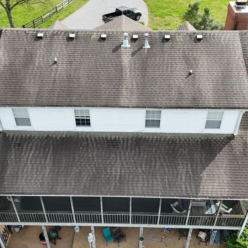 Asphalt shingle roof with hail damage visible from above