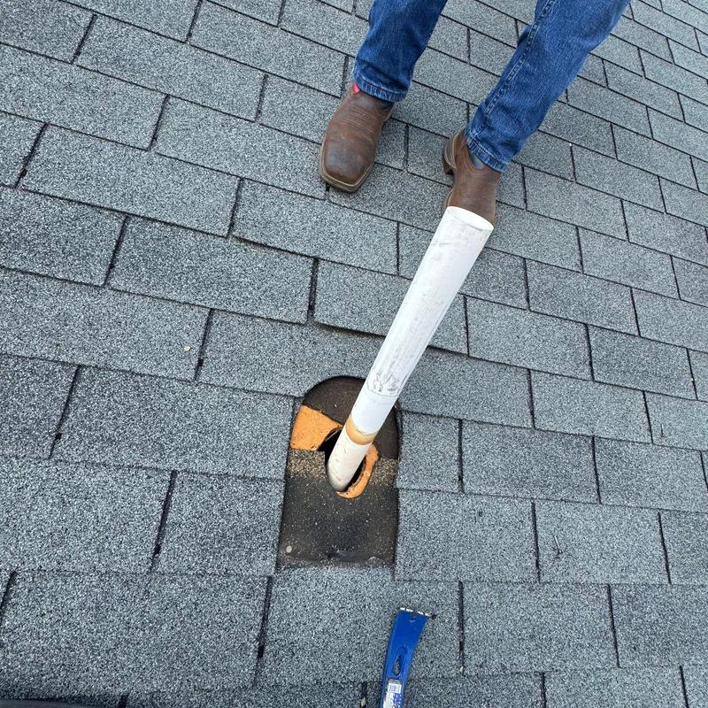 Roof vent pipe and damaged shingles inspection
