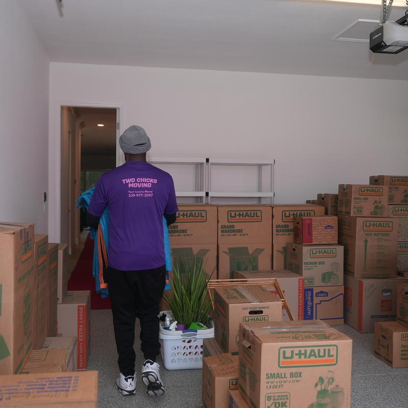 Moving boxes and clothes packing in garage storage