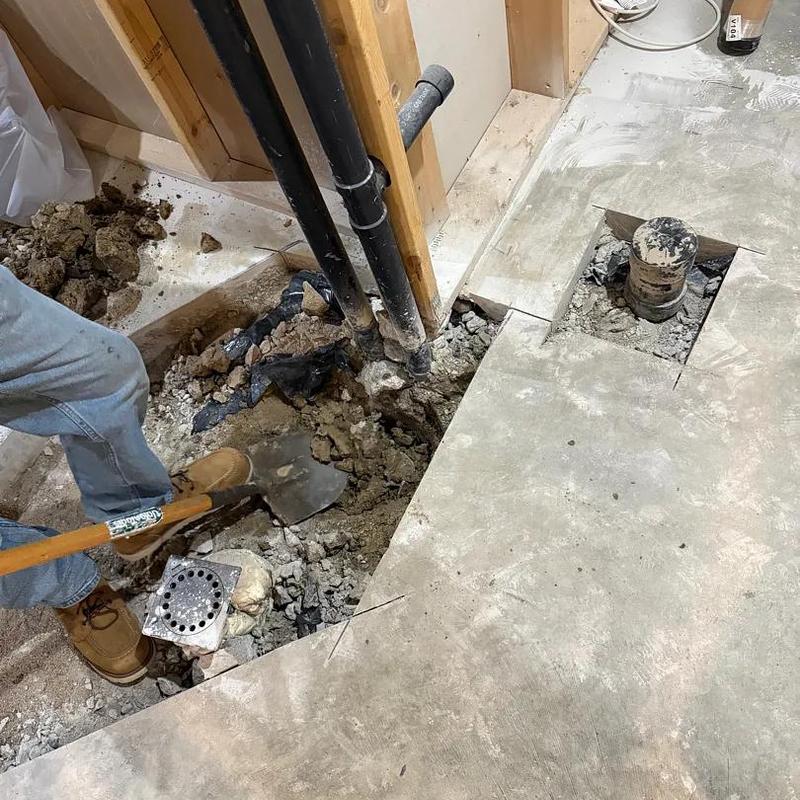 Basement bathroom drain and vent pipe installation