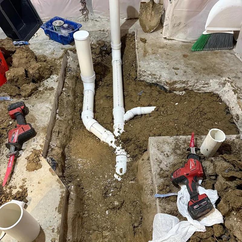Basement bathroom drain and vent piping installation