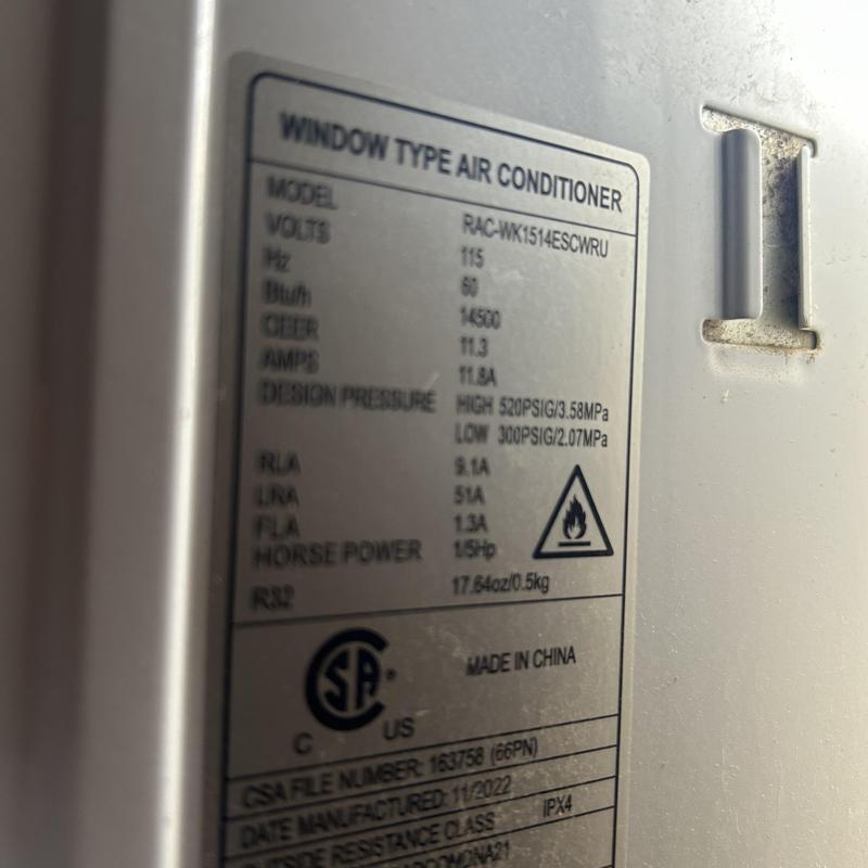 Window type air conditioner label showing electrical specs Window type air conditioner label showing electrical specs