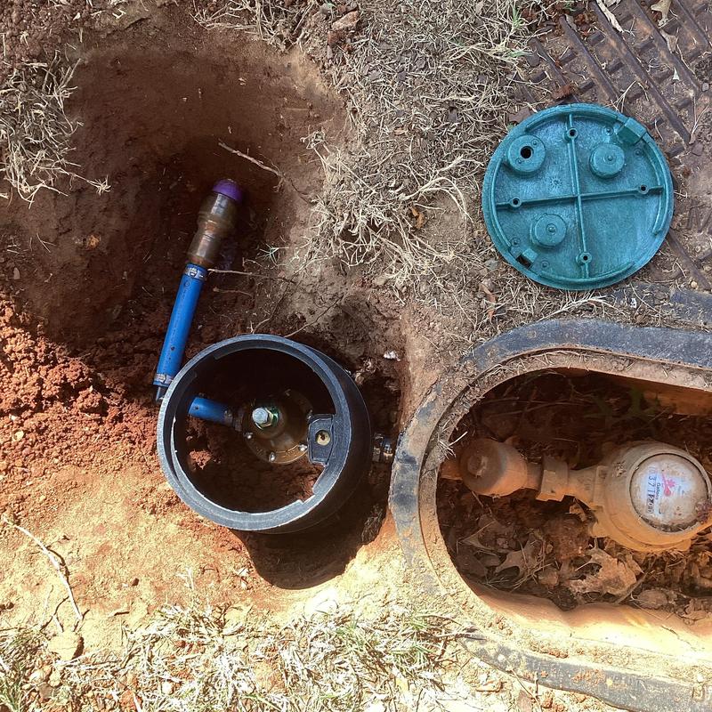 Pressure reducing valve with PVC and male adapters installed