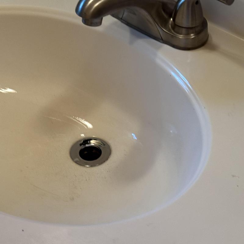 Lavatory sink drain with metal faucet fixture Lavatory sink drain with metal faucet fixture
