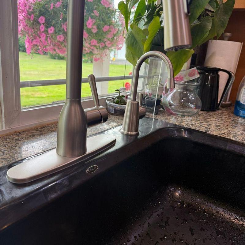 Single-handle pull-down kitchen faucet with soap dispenser