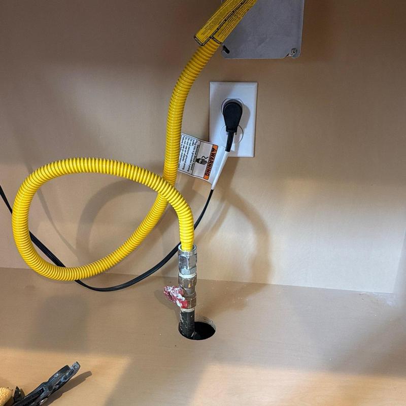 Gas line with capped valve under countertop Gas line with capped valve under countertop