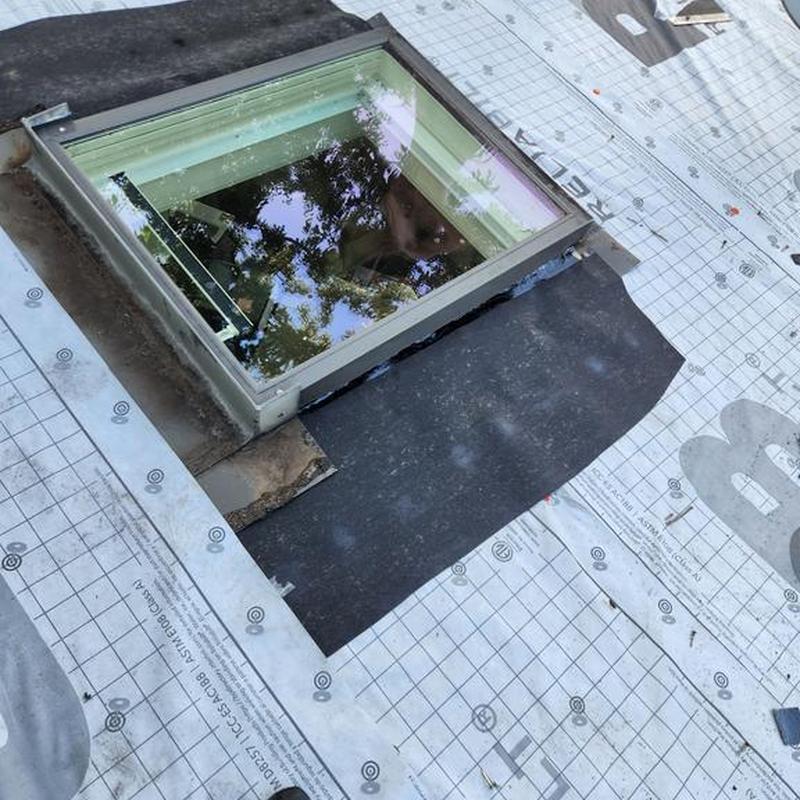 Skylight re-flashing with ice and water shield underlayment