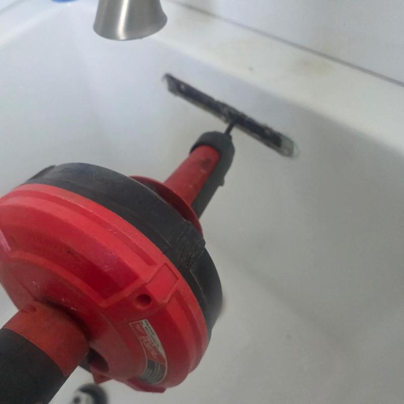 Bathtub overflow drain cable snake cleaning tool