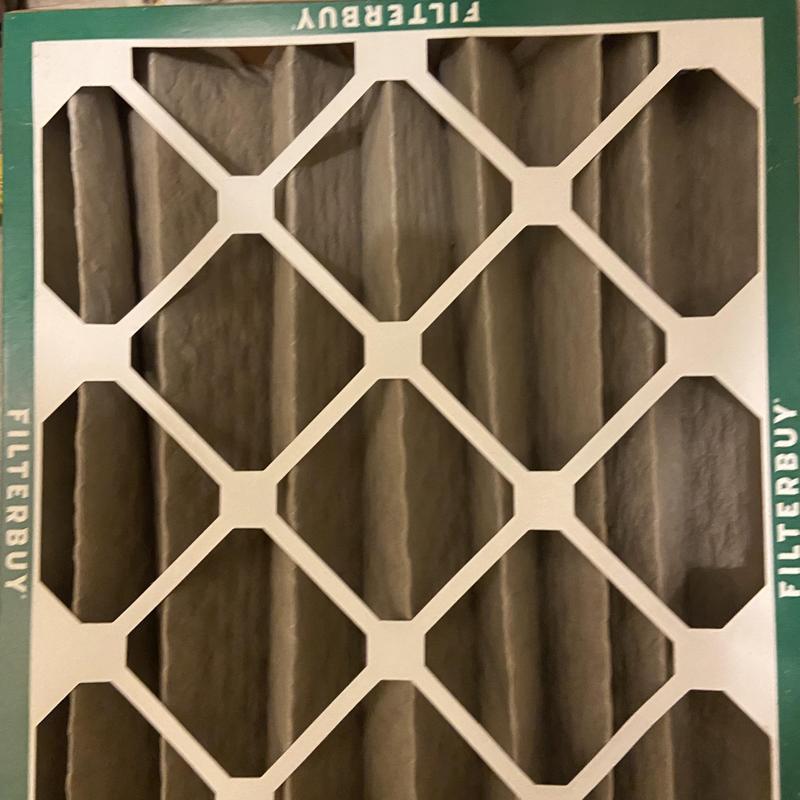 HVAC air filter clogged with dust dirt buildup HVAC air filter clogged with dust dirt buildup