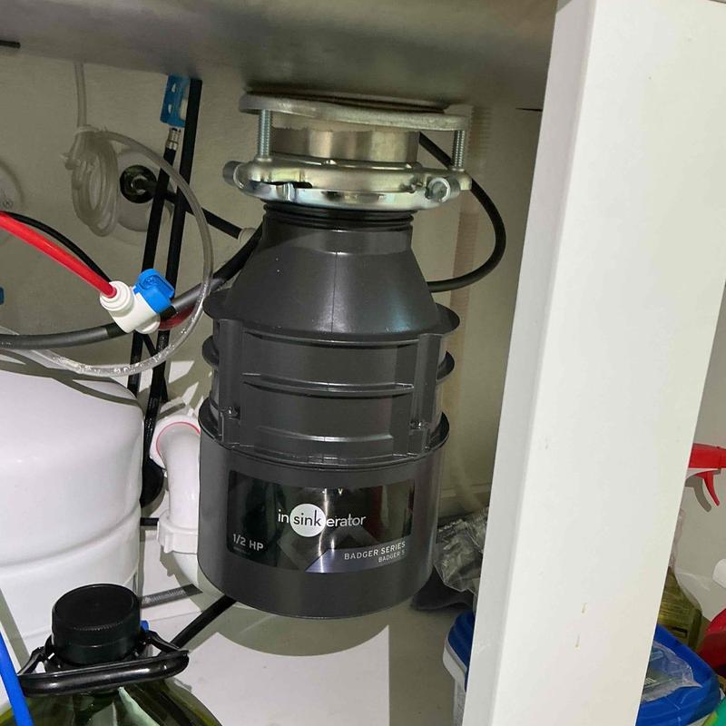 Garbage disposal unit installed under sink