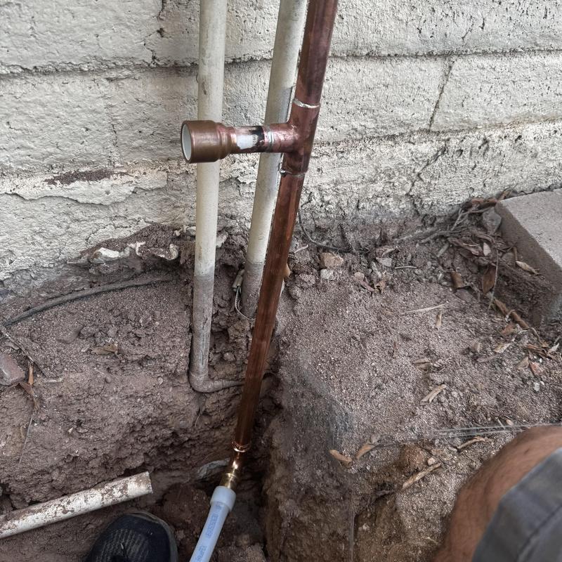 Copper water main pipe installation near foundation wall Copper water main pipe installation near foundation wall