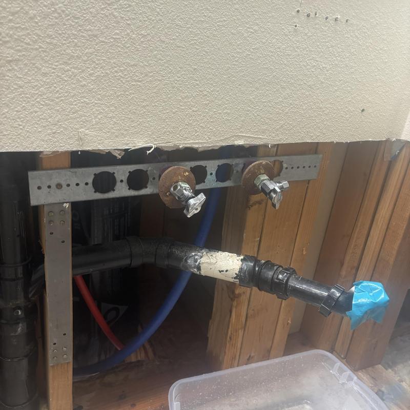 Plastic drain pipe with valves in wall cavity Plastic drain pipe with valves in wall cavity