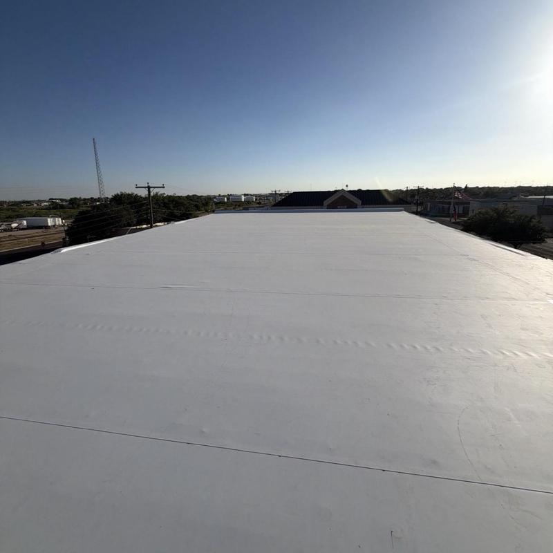 TPO roofing system over existing metal roof