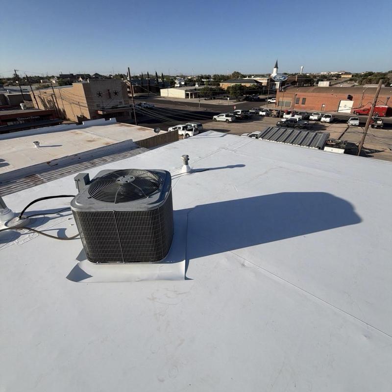 TPO roofing system with HVAC unit on flat roof