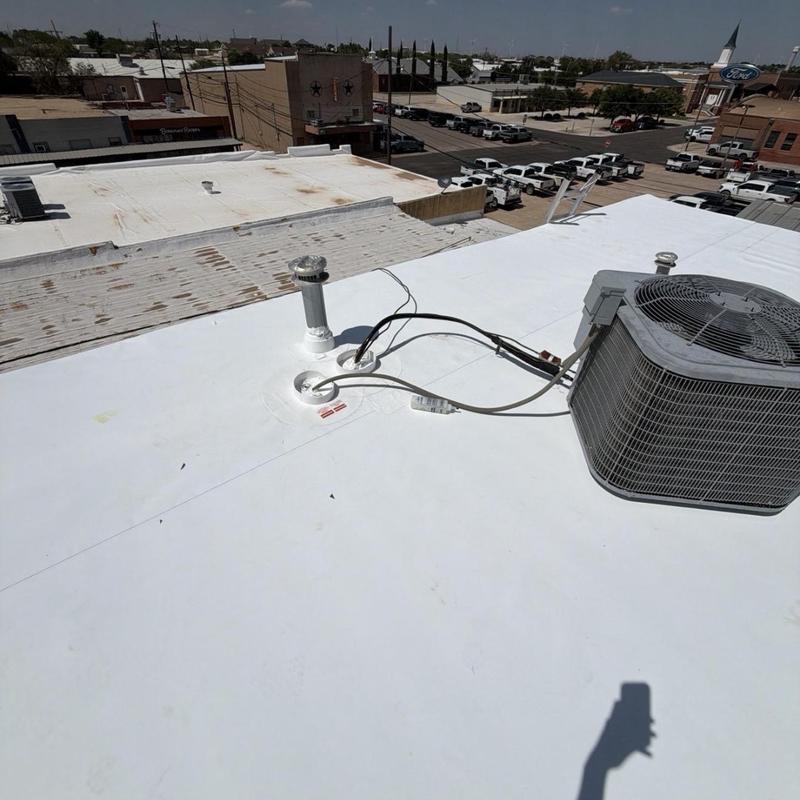 TPO roofing system with HVAC unit on flat roof