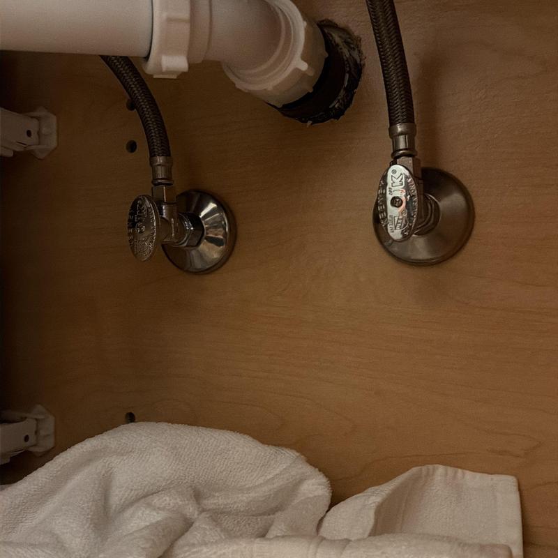 Angle stop valves under sink with supply lines