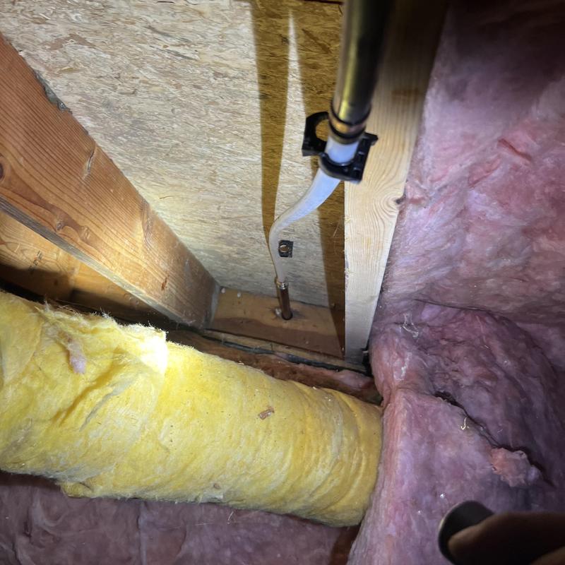 Polybutylene plumbing pipe in crawl space with insulation Polybutylene plumbing pipe in crawl space with insulation