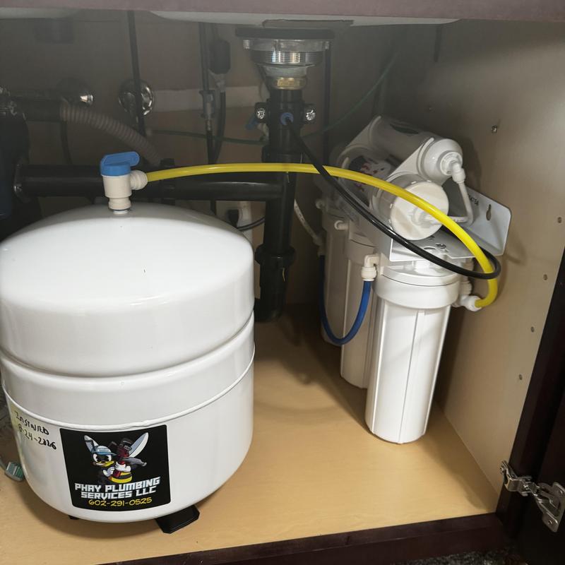 Reverse osmosis water filtration system installed under sink