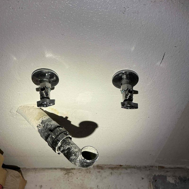 Angle stop valves with drain pipe connections under sink