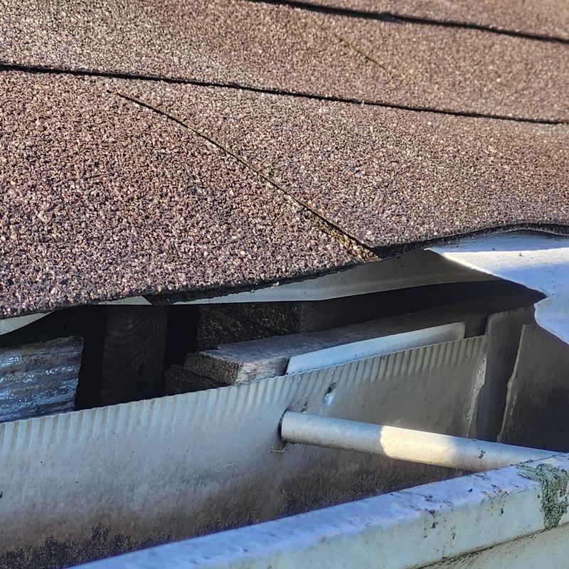 Gutter and fascia pulling away from roof edge Gutter and fascia pulling away from roof edge