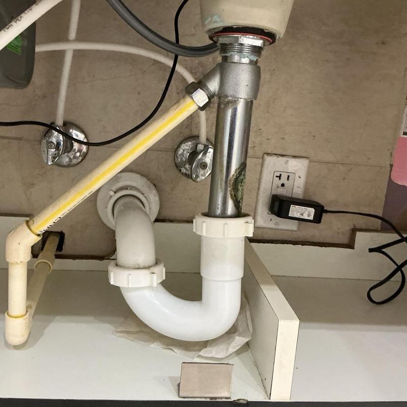 Cold supply line valve and drain pipe connection under sink Cold supply line valve and drain pipe connection under sink