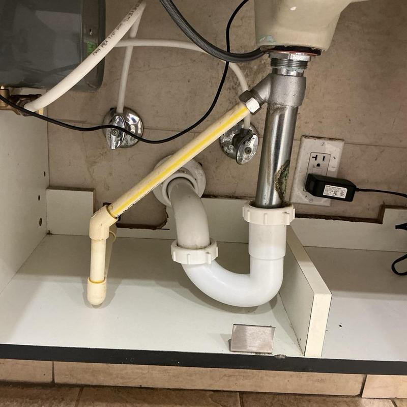 Cold water supply line under sink tightened Cold water supply line under sink tightened