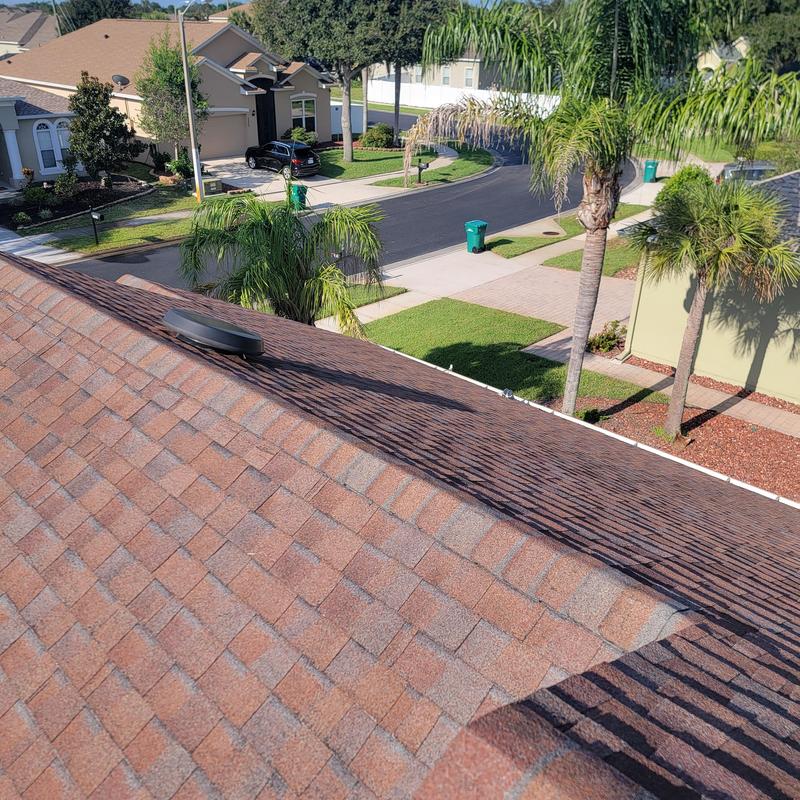 Asphalt shingle roof inspection on residential house Asphalt shingle roof inspection on residential house